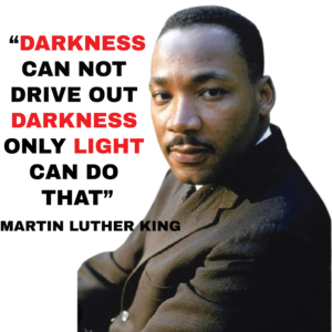 Man in suit with inspirational text background.